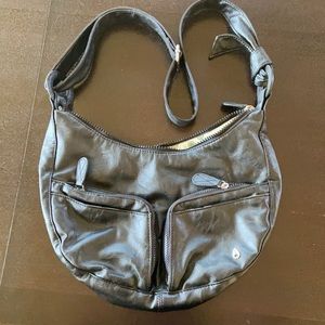 Nixon Purse!  Black with awesome polka dot lining!